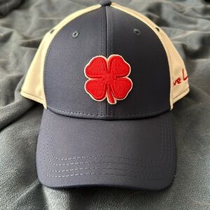 Black Clover Hat Size Small/Medium—Red, White, and Blue in color.